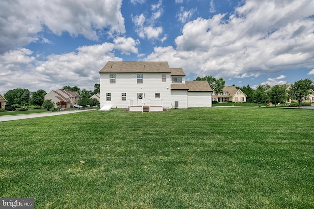 1201 Falls Grove Ln, York, PA 17404 - rear view of house featuring a lawn