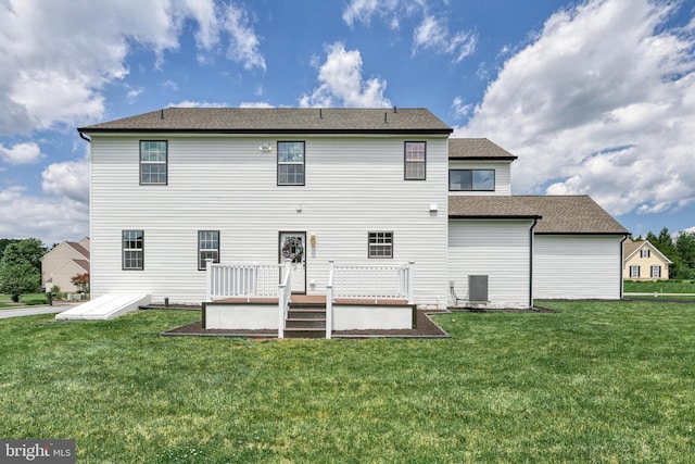 1201 Falls Grove Ln, York, PA 17404 - back of house featuring a deck, a lawn, and central AC unit