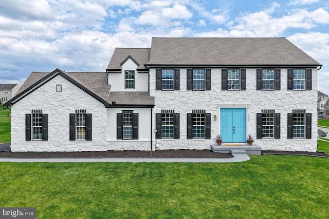 1201 Falls Grove Ln, York, PA 17404 - view of front of house with roof with shingles, stone siding, and a front yard