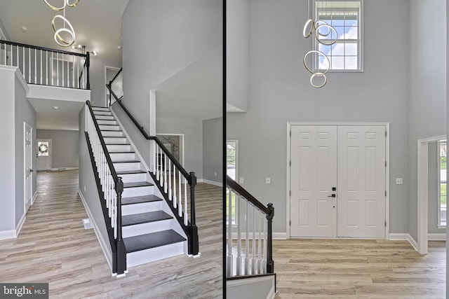 1201 Falls Grove Ln, York, PA 17404 - foyer featuring a towering ceiling, wood finished floors, stairs, and baseboards