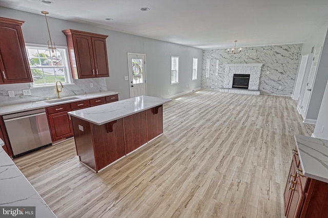 1201 Falls Grove Ln, York, PA 17404 - kitchen with dishwasher, healthy amount of natural light, open floor plan, and reddish brown cabinets