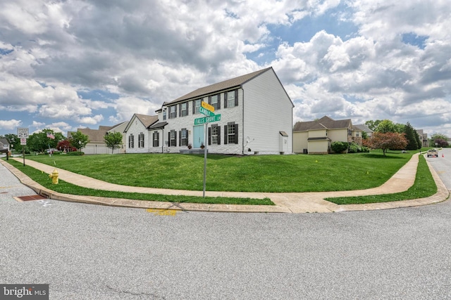 1201 Falls Grove Ln, York, PA 17404 - colonial-style house with a front lawn and a residential view