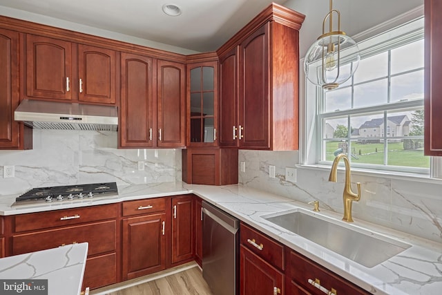 1201 Falls Grove Ln, York, PA 17404 - kitchen featuring appliances with stainless steel finishes, a sink, extractor fan, and light stone countertops