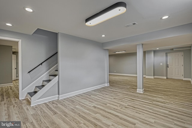 1201 Falls Grove Ln, York, PA 17404 - finished basement featuring light wood-style flooring, baseboards, stairway, and recessed lighting