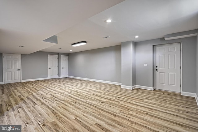 1201 Falls Grove Ln, York, PA 17404 - finished basement with baseboards, wood finished floors, and recessed lighting