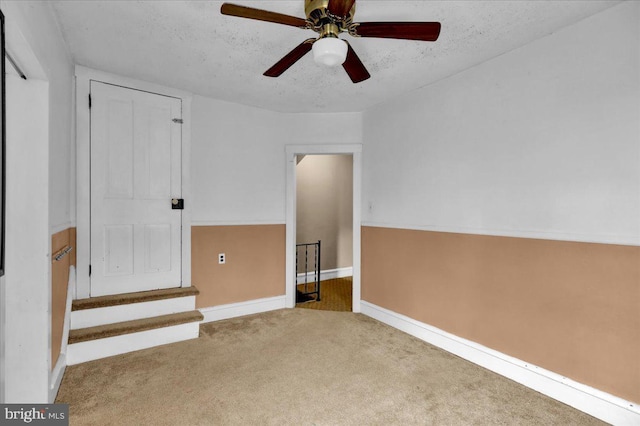 64 W Fairview St, Mohnton, PA 19540 - unfurnished room featuring carpet floors, ceiling fan, baseboards, and a textured ceiling