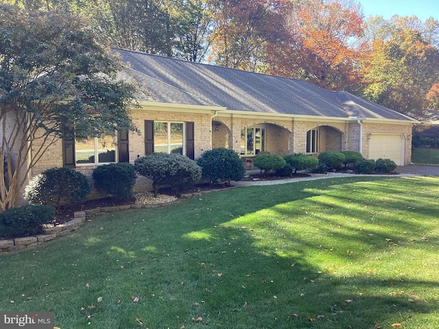 614 Cedarday Dr, Bel Air, MD 21015 - ranch-style house featuring an attached garage, a front yard, brick siding, and a shingled roof
