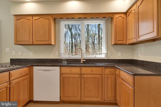 614 Cedarday Dr, Bel Air, MD 21015 - kitchen featuring dishwasher, a sink, dark stone countertops, and brown cabinetry