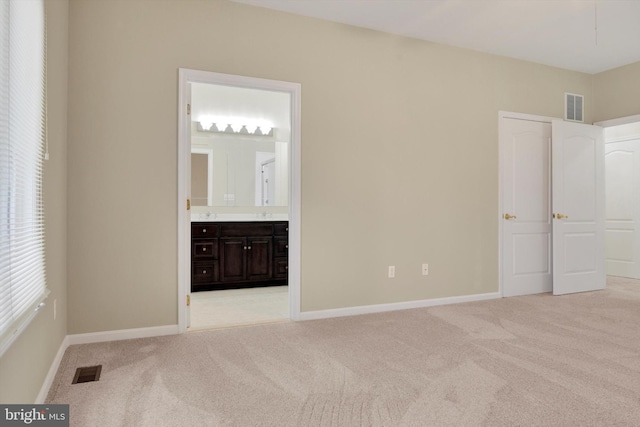 614 Cedarday Dr, Bel Air, MD 21015 - unfurnished bedroom featuring light carpet, baseboards, and ensuite bath