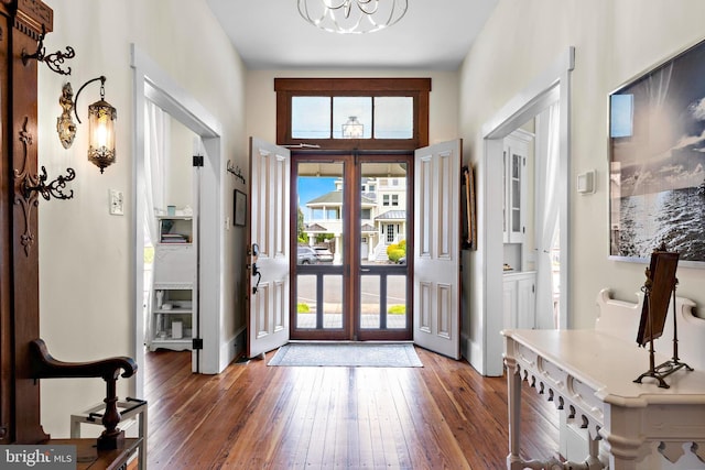 123 Coral St, Beach Haven, NJ 08008 - foyer entrance featuring hardwood / wood-style floors, a chandelier, and baseboards