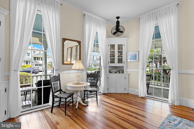 123 Coral St, Beach Haven, NJ 08008 - living area with wood-type flooring, plenty of natural light, and baseboards