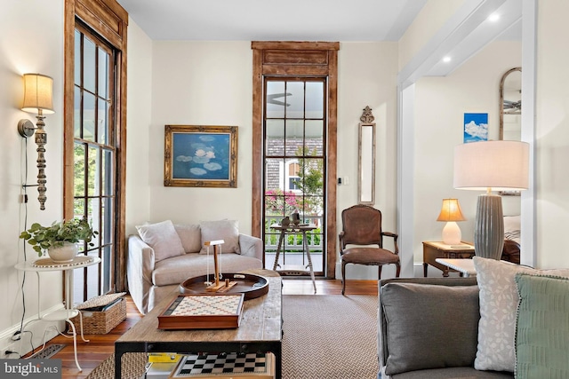 123 Coral St, Beach Haven, NJ 08008 - living area with plenty of natural light, baseboards, and wood finished floors