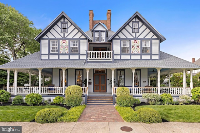 123 Coral St, Beach Haven, NJ 08008 - view of front facade featuring covered porch and a shingled roof
