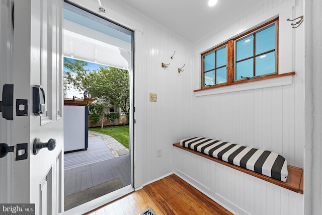 123 Coral St, Beach Haven, NJ 08008 - doorway to outside with hardwood / wood-style floors and crown molding