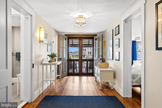 123 Coral St, Beach Haven, NJ 08008 - foyer entrance featuring hardwood / wood-style floors, french doors, and baseboards