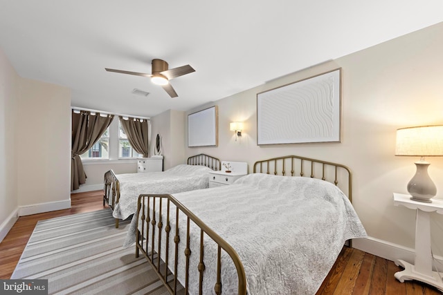 123 Coral St, Beach Haven, NJ 08008 - bedroom with wood finished floors, baseboards, and a ceiling fan