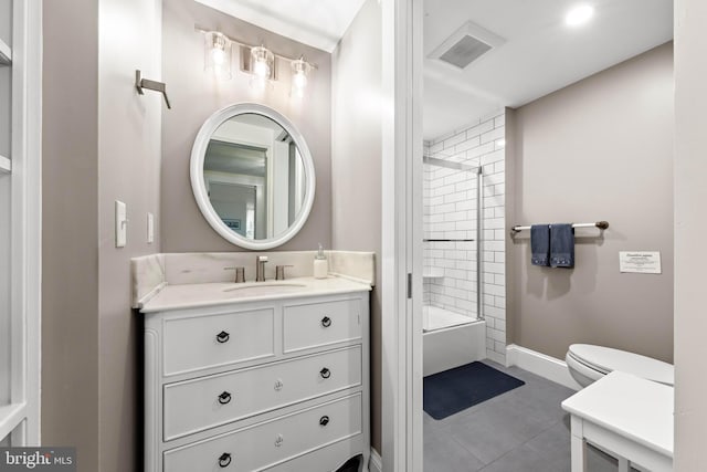 123 Coral St, Beach Haven, NJ 08008 - bathroom featuring vanity, tile patterned floors, enclosed tub / shower combo, toilet, and baseboards