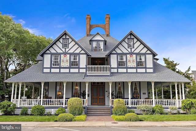 123 Coral St, Beach Haven, NJ 08008 - view of front of property with covered porch and a shingled roof