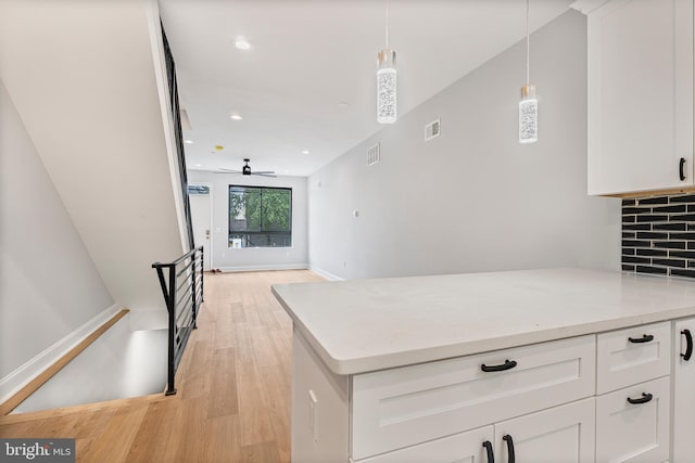1838 N 4th St, Philadelphia, PA 19122 - kitchen with light wood-style floors, white cabinetry, ceiling fan, backsplash, and recessed lighting