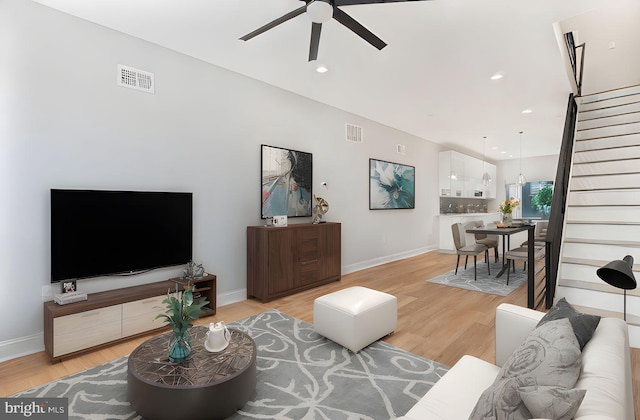 1838 N 4th St, Philadelphia, PA 19122 - living room featuring a ceiling fan, stairway, light wood-style flooring, and recessed lighting