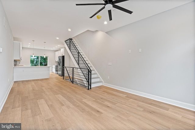 1838 N 4th St, Philadelphia, PA 19122 - unfurnished living room featuring a ceiling fan, light wood-type flooring, stairway, and recessed lighting