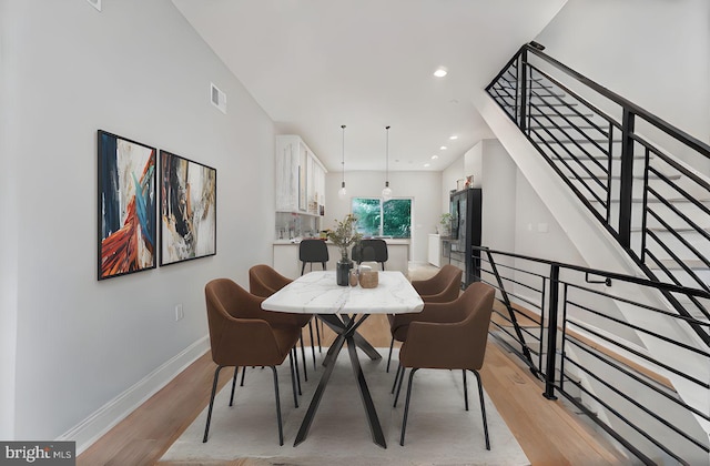 1838 N 4th St, Philadelphia, PA 19122 - dining area with light wood-style flooring, recessed lighting, and stairway