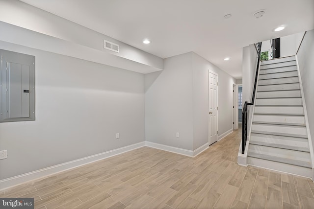 1838 N 4th St, Philadelphia, PA 19122 - basement with electric panel, light wood-type flooring, stairway, and recessed lighting