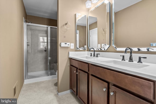 22650 Gray Falcon, Ashburn, VA 20148 - full bath with a stall shower, double vanity, and baseboards
