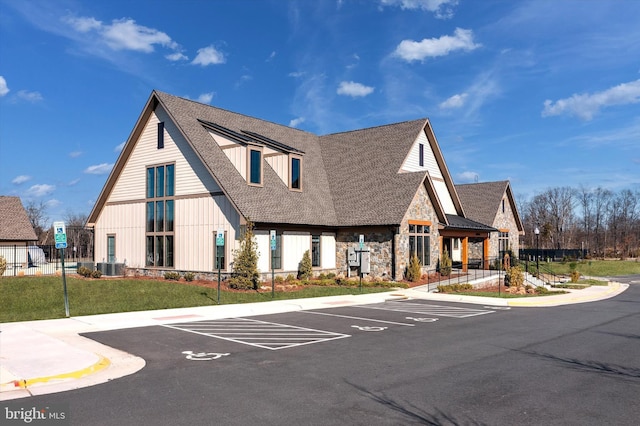 22650 Gray Falcon, Ashburn, VA 20148 - view of property with uncovered parking and central AC