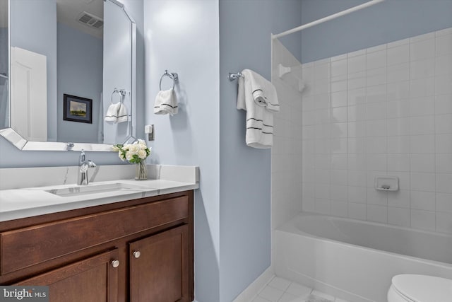22650 Gray Falcon, Ashburn, VA 20148 - full bathroom with vanity, toilet, bathtub / shower combination, tile patterned flooring, and baseboards