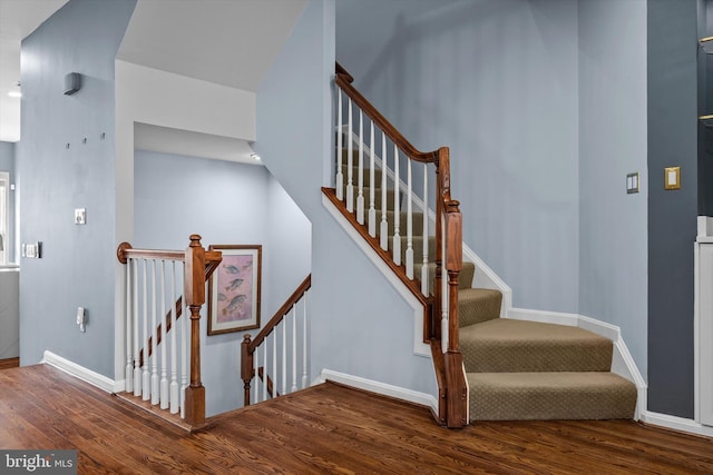 22650 Gray Falcon, Ashburn, VA 20148 - staircase featuring wood finished floors and baseboards