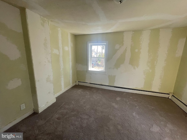 27 Church St, Bridgeton, NJ 08302 - carpeted empty room with baseboard heating and baseboards