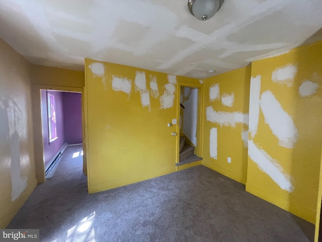 27 Church St, Bridgeton, NJ 08302 - carpeted empty room with a baseboard radiator, stairway, and baseboards
