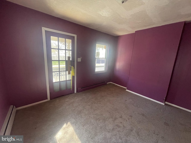 27 Church St, Bridgeton, NJ 08302 - entryway with a baseboard radiator, a textured ceiling, carpet flooring, and baseboards