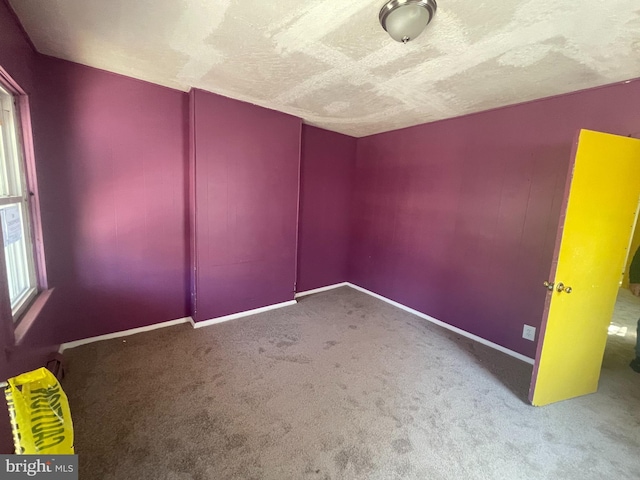 27 Church St, Bridgeton, NJ 08302 - spare room with carpet, baseboards, and a textured ceiling