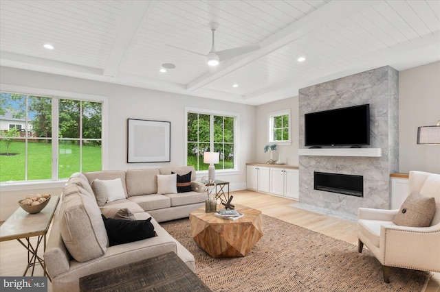 6613 Byrnes Dr, Mclean, VA 22101 - living area with light wood finished floors, a fireplace, beamed ceiling, recessed lighting, and a ceiling fan