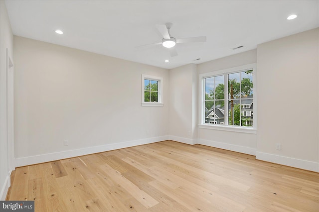 6613 Byrnes Dr, Mclean, VA 22101 - spare room featuring wood finished floors, baseboards, ceiling fan, and recessed lighting