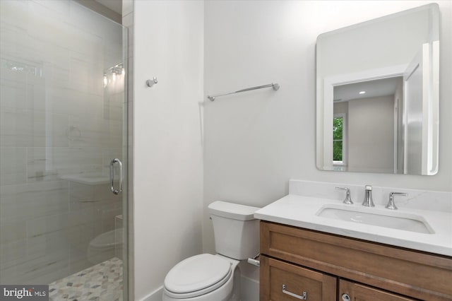 6613 Byrnes Dr, Mclean, VA 22101 - bathroom featuring toilet, vanity, and a shower stall