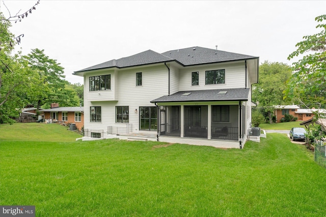 6613 Byrnes Dr, Mclean, VA 22101 - back of house featuring a sunroom, a shingled roof, a yard, and central AC unit