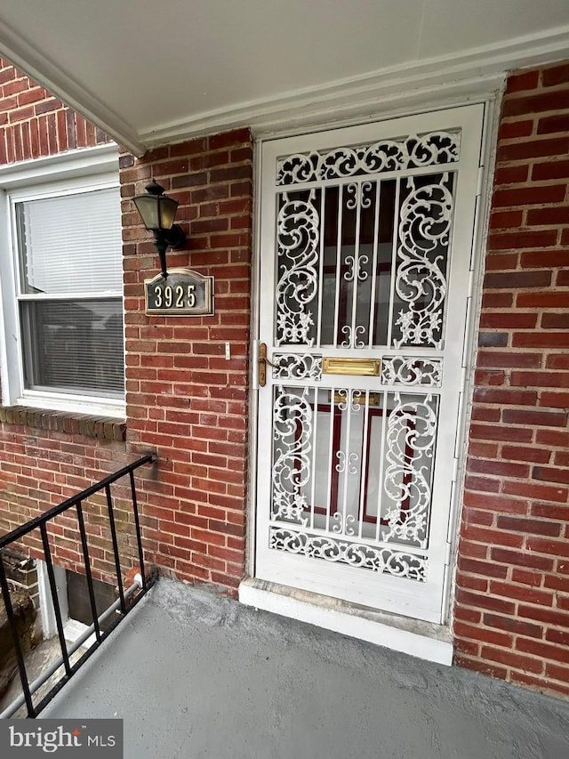 3925 Colborne Rd, Baltimore, MD 21229 - view of exterior entry with brick siding