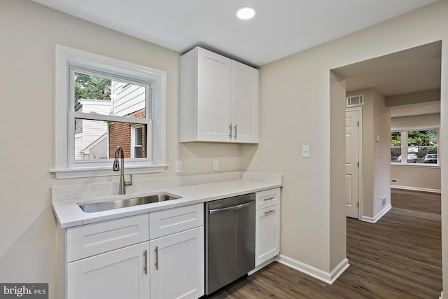 5210 57th Ave, Hyattsville, MD 20781 - kitchen with dishwasher, a sink, baseboards, dark wood-style floors, and plenty of natural light