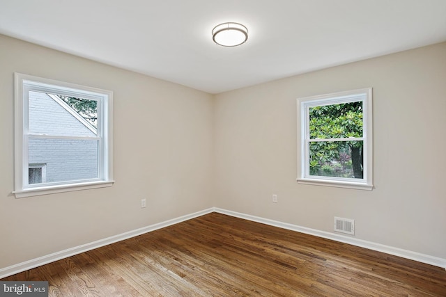 5210 57th Ave, Hyattsville, MD 20781 - spare room with baseboards and dark wood finished floors