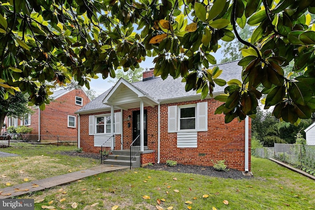 5210 57th Ave, Hyattsville, MD 20781 - bungalow-style house with brick siding, a chimney, and roof with shingles