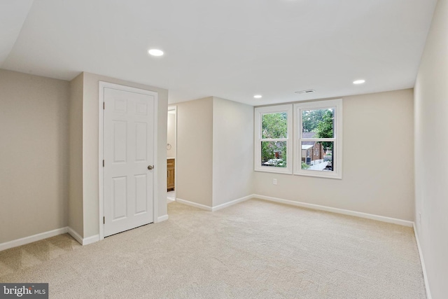 5210 57th Ave, Hyattsville, MD 20781 - empty room featuring light colored carpet, baseboards, and recessed lighting