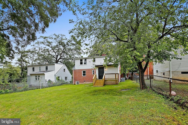5210 57th Ave, Hyattsville, MD 20781 - rear view of house with brick siding, central AC unit, and a chimney