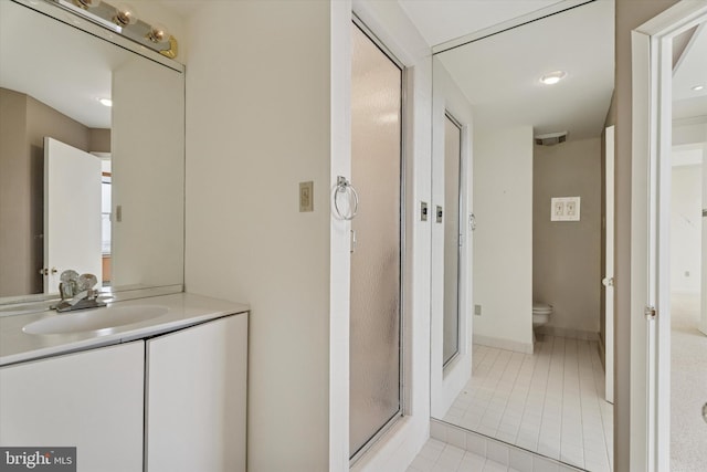 50 Belmont Ave Unit 1016/1116, Bala Cynwyd, PA 19004 - bathroom with tile patterned floors, vanity, toilet, and a stall shower