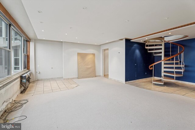 50 Belmont Ave Unit 1016/1116, Bala Cynwyd, PA 19004 - unfurnished living room featuring stairway, tile patterned floors, carpet flooring, recessed lighting, and baseboards