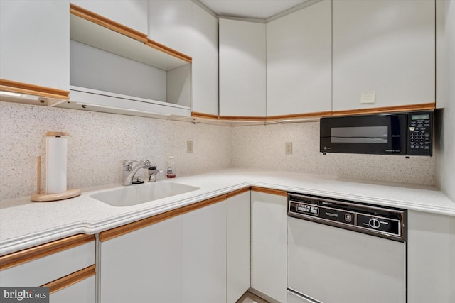50 Belmont Ave Unit 1016/1116, Bala Cynwyd, PA 19004 - kitchen featuring dishwasher, black microwave, a sink, open shelves, and decorative backsplash