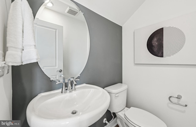 1201 Bear Oak Ln Unit 2, Laurel, MD 20724 - half bath featuring a sink, toilet, and lofted ceiling