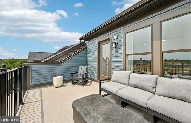 1201 Bear Oak Ln Unit 2, Laurel, MD 20724 - view of patio featuring outdoor lounge area and a balcony